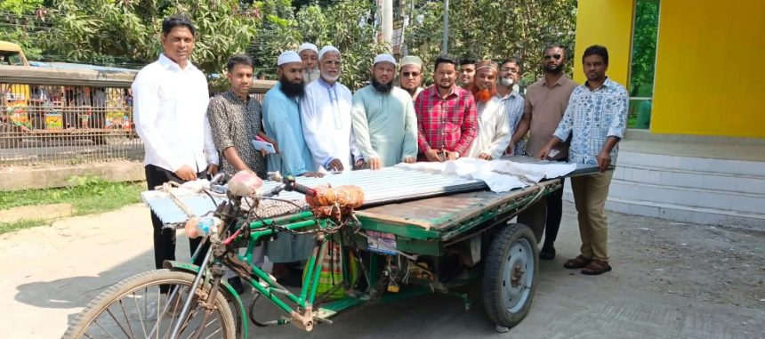 Messenger_creation_1642504874027112 শ্রীপুরে অগ্নিকাণ্ডে পুড়ে যাওয়া মসজিদে এমপি বাচ্চুর পক্ষ থেকে টিন ও নগদ অর্থ প্রদান